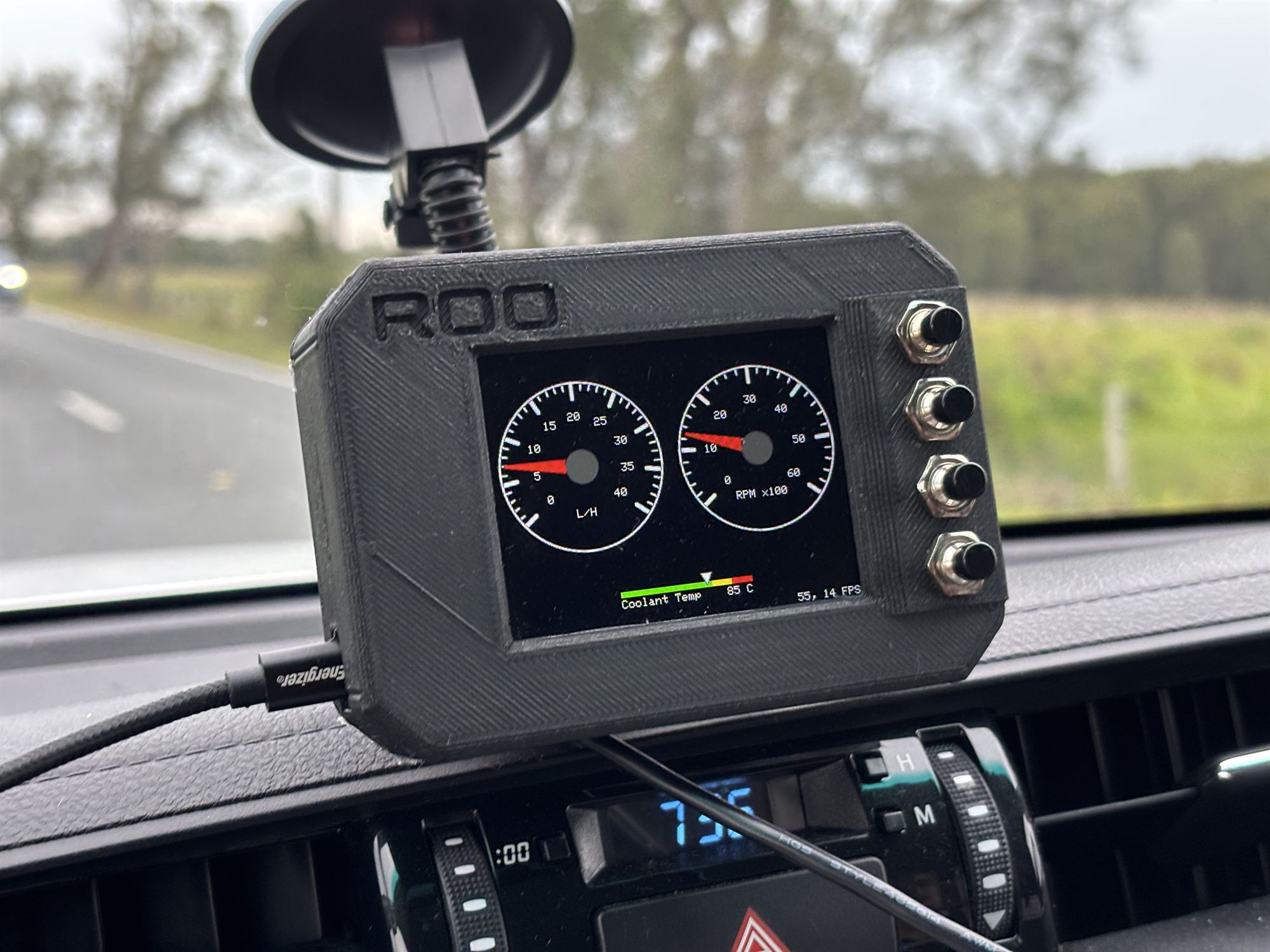 The Roo, our weekend project: a 3D-printed case on a suction mount, two round gauges on screen and four push buttons